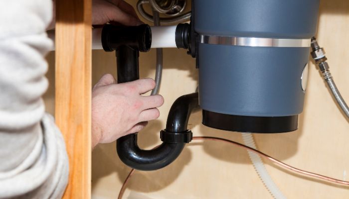 How to unclog a garbage disposal with standing water